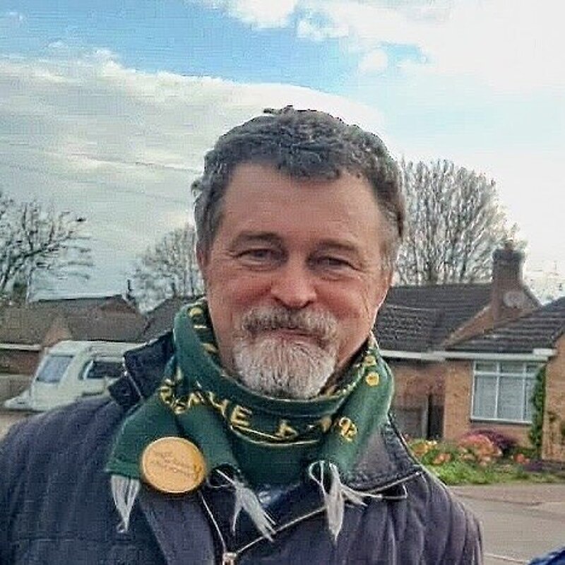 ALAN CHALMERS STANDS OPPOSITE SOME BUNGALOWS IN KENILWORTH