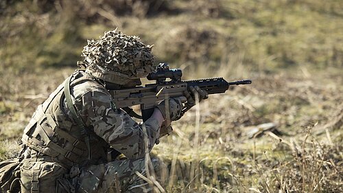 A soldier fires at a target Pictured: A soldier fires at a target during a Live Range serial whilst on the The Light Close Recognisance Commanders Course.
