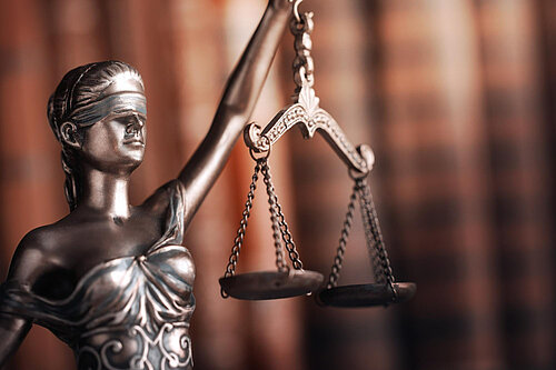Lady justice - blindfolded and holding the scales of justice